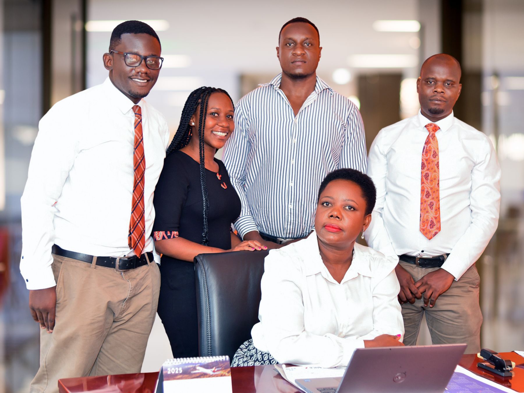 Iconic Travel Services staff in the Kampala office