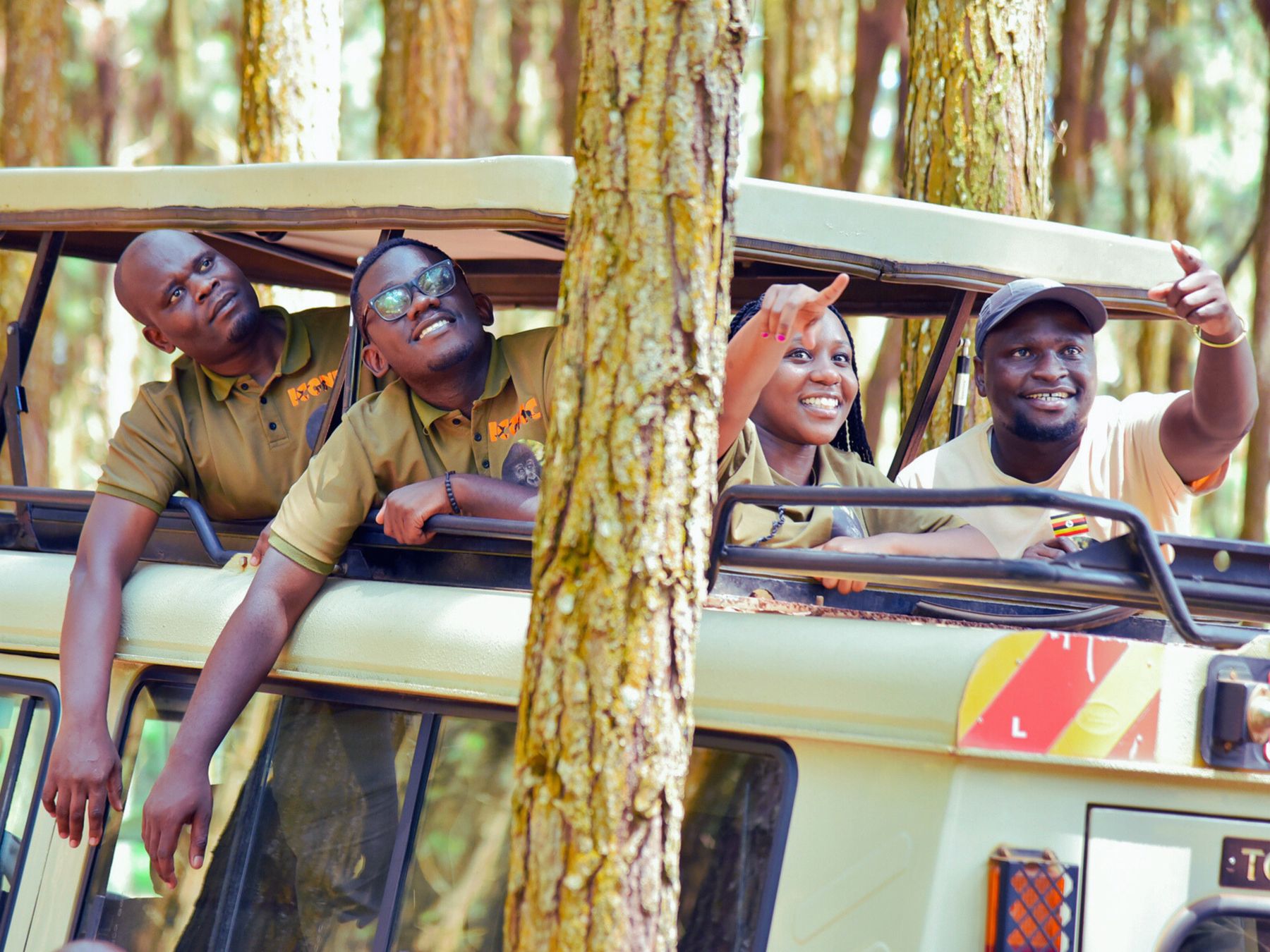 Iconic Travel Services guides in a safari vehicle